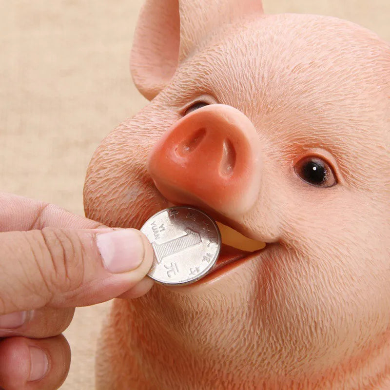 Tirelire enfant cochon assis