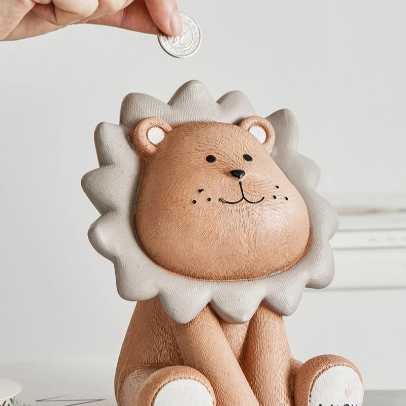 Tirelire enfant lion assis