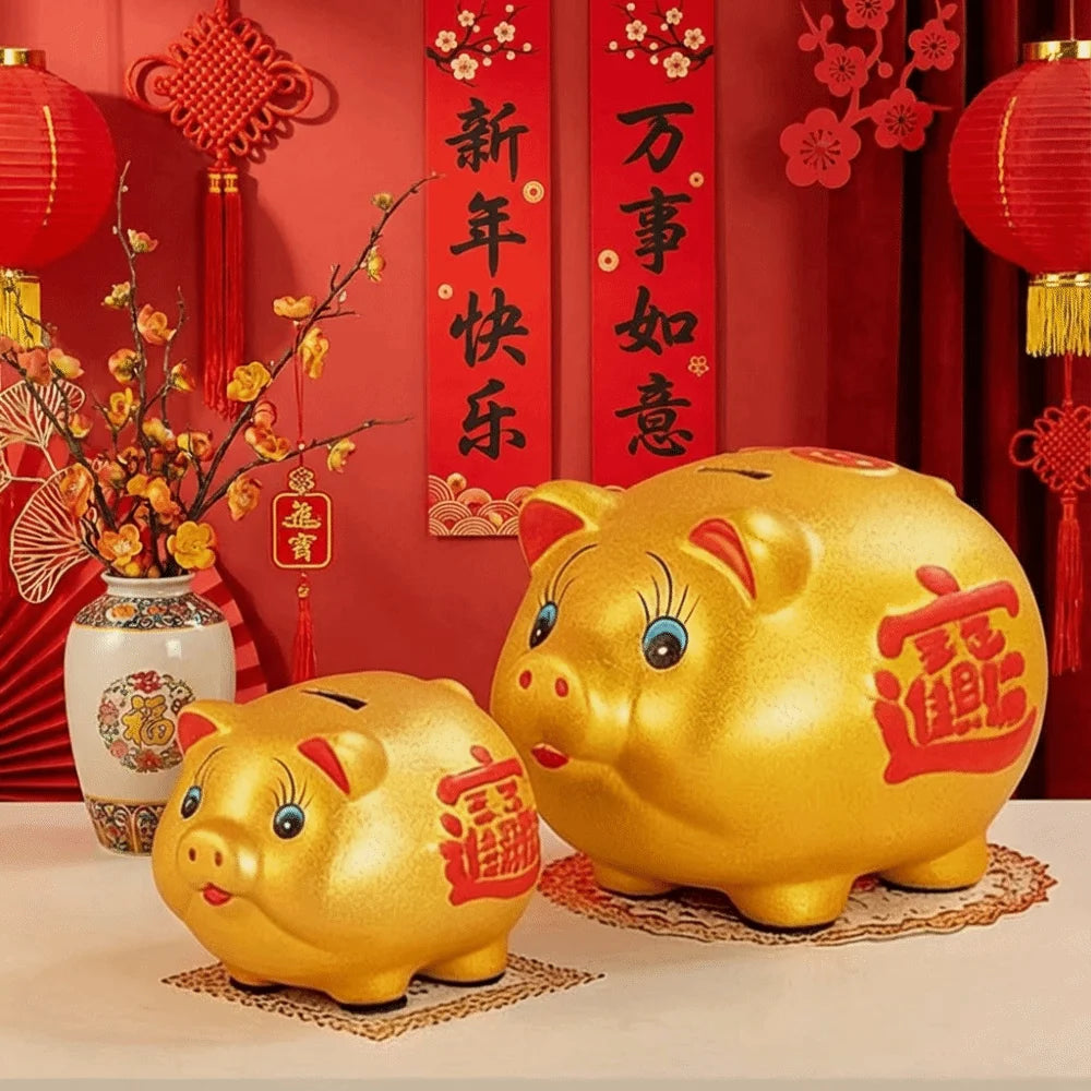 Tirelire enfant cochon dorée